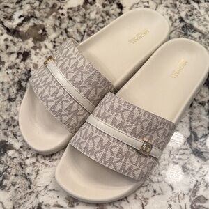 Michael Kors Cream Logo Slip-On Sandals with Gold Accent..size 8